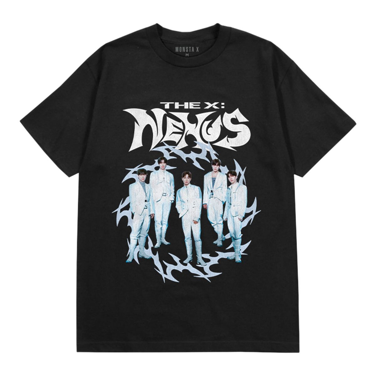 A black short-sleeve graphic t-shirt featuring the band, THE X: NEXUS in stylized white lettering above a circular graphic of five members in white suits surrounded by jagged light blue energy shapes. The brand name 'MONSTA X' is printed inside the collar.