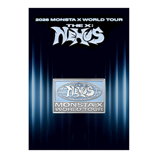 A collectible enamel pin for the 2026 Monsta X World Tour, shown on its dark blue backing card. The pin features a silver border and a light blue background with the 'Monsta X World Tour' logo in the center.